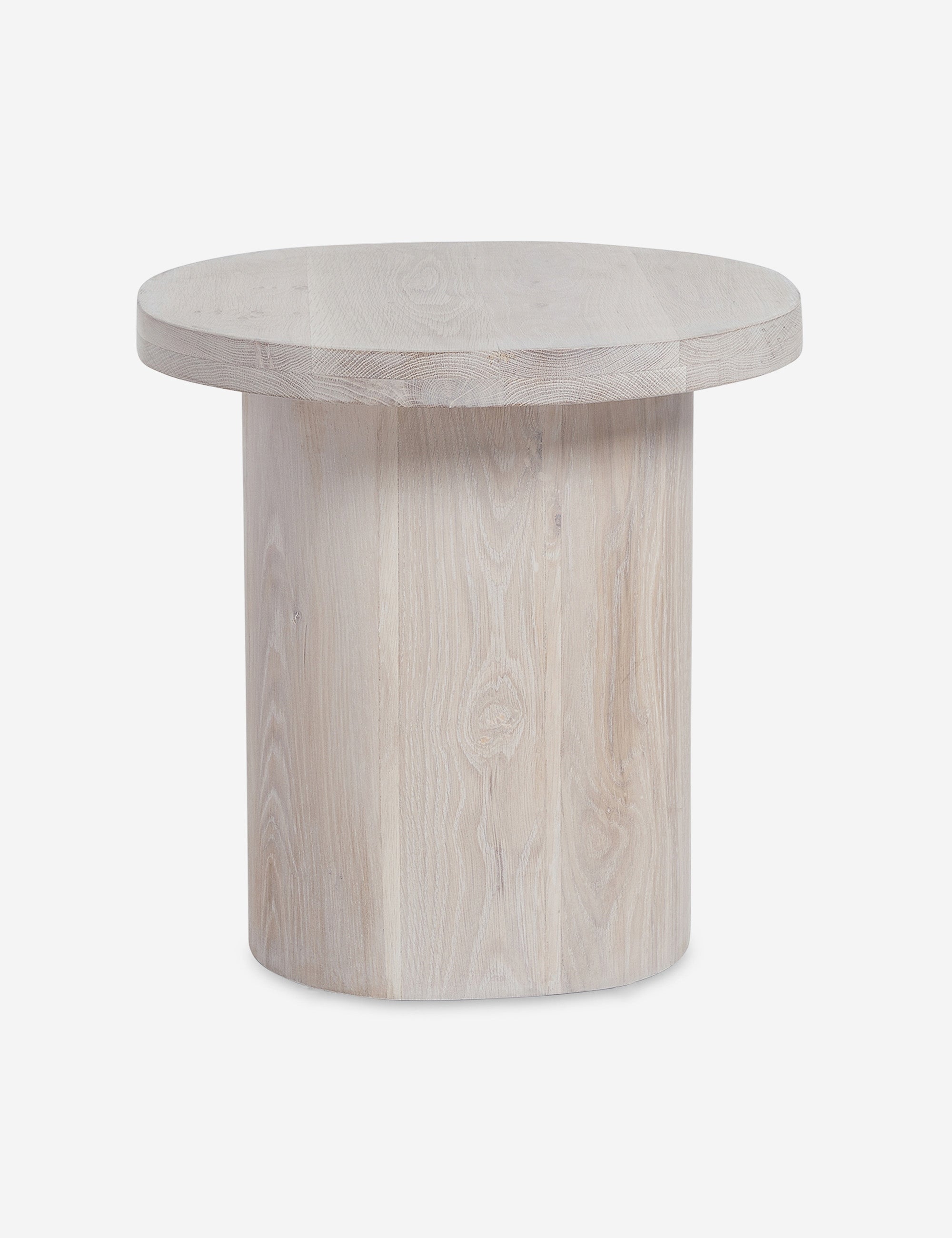 Angled view of the Luna washed-oak wood round side table