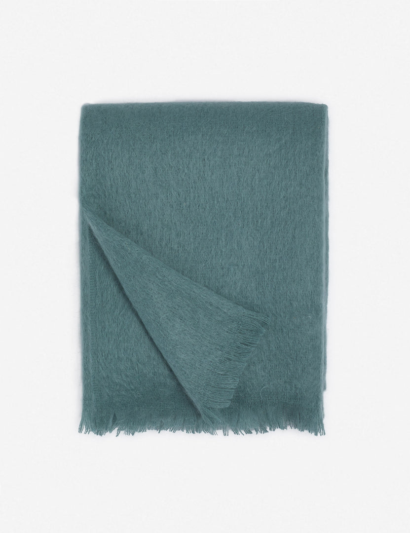 #color::blue | Aimee mohair blue wool throw blanket with fringe ends with the corner folded in