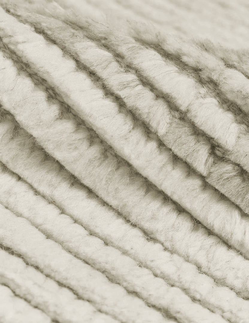 #size::2-6--x-8- #size::6--x-9- #size::8--x-10- #size::9--x-12- #size::10--x-14- #size::12--x-15- | Close-up of the two-toned ribbed fabric on the Nomad neutral-toned geometric floor rug by Élan Byrd