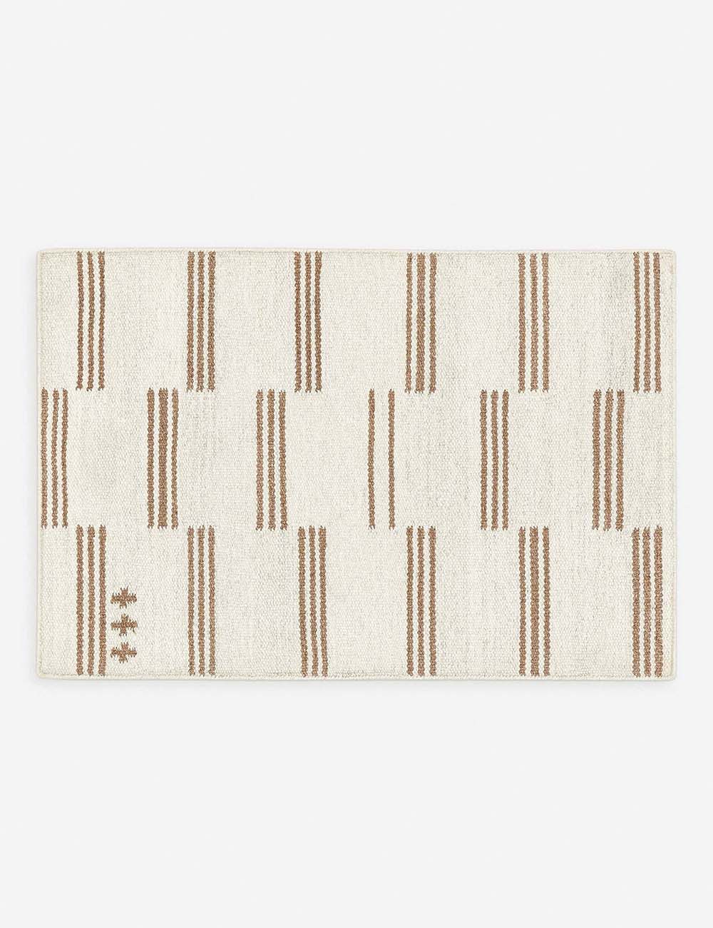 Stripe break flatweave rug by Sarah Sherman Samuel